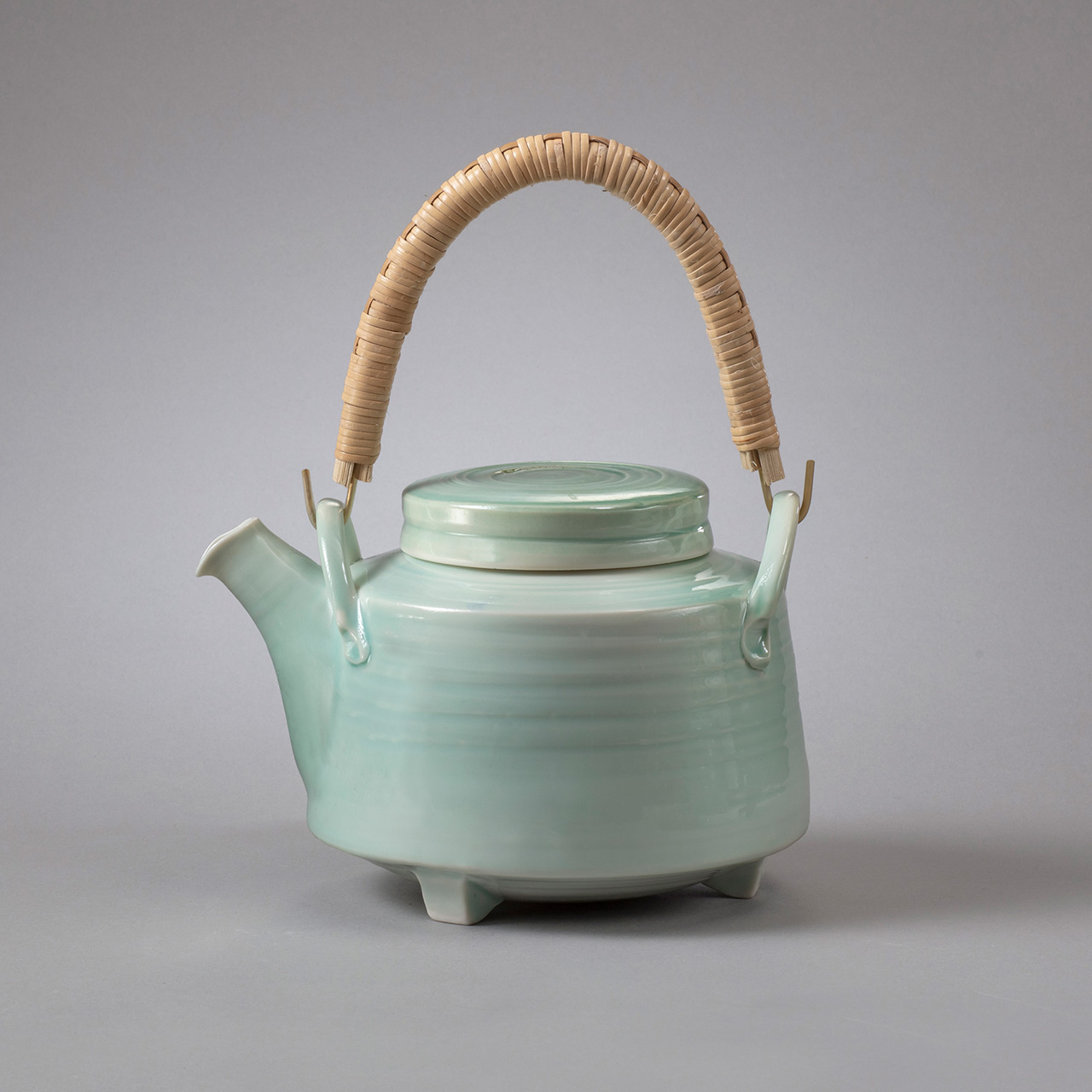 tepotte_turkis-porcelain_braided-handle_Sauer Tepotte i porcelæn med flettet hank